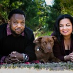 couple with brown dog