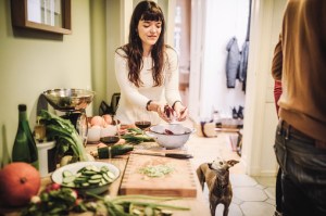 woman preparing food on a table