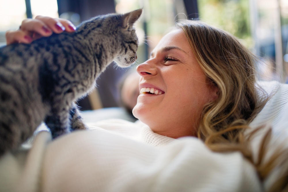 happy woman with cat