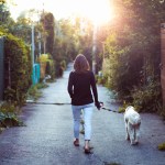 woman walking dog