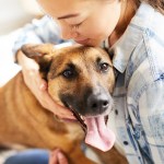 Woman holding a dog