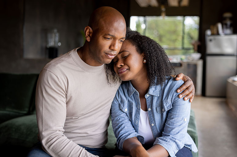 Couple looking sad