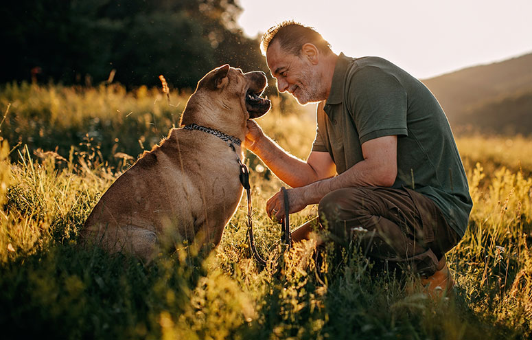 Happy man and dog.