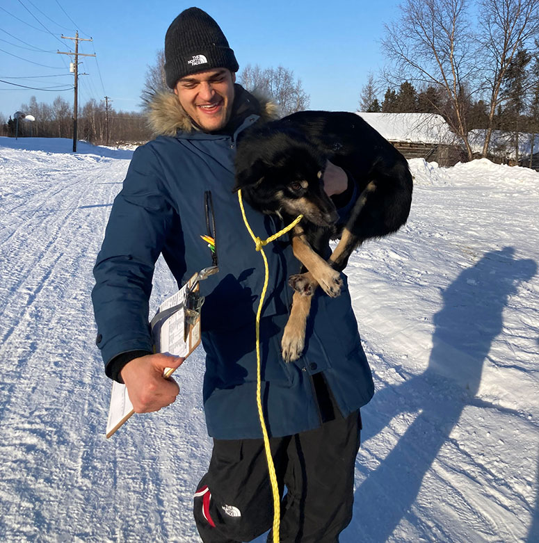 Dr. Zac Pilossoph, working at the Iditarod. 